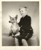 Stuart-cindy01: "Me as a 7yo pageboy at my aunt's wedding with my Pembrokeshire corgi 'Cindy'. Actually her name was something li